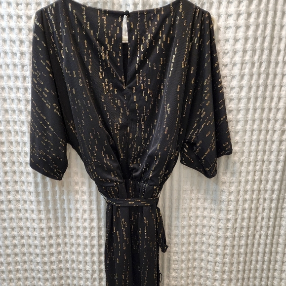 Black and gold foil Jessica Simpson dress with beautiful slit arms. - Picture 2 of 5